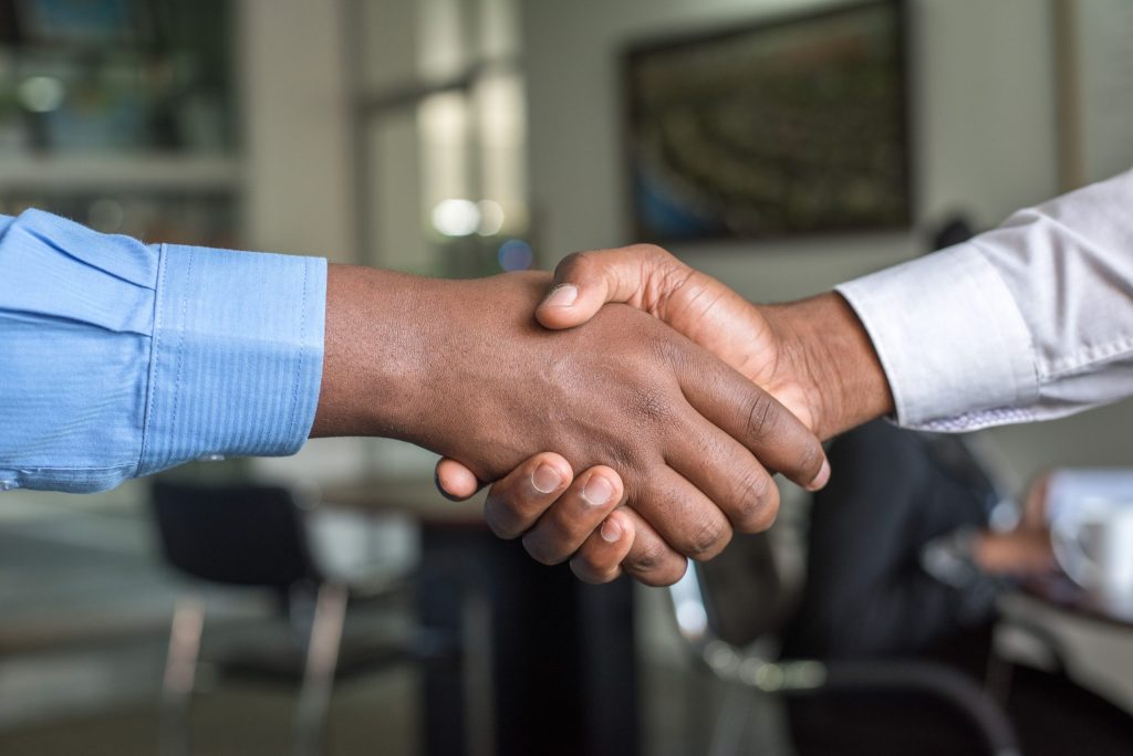 A handshake between two professionals